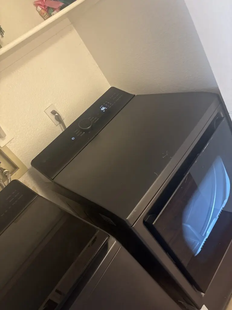 Washer and dryer pair in a laundry room (job photo)